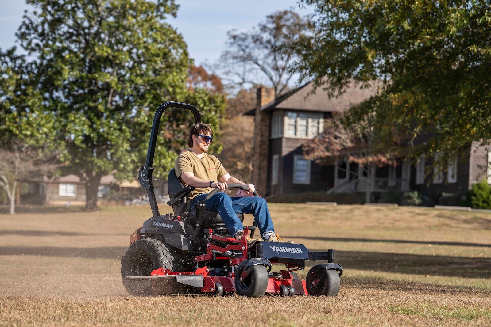 man mowing his yard