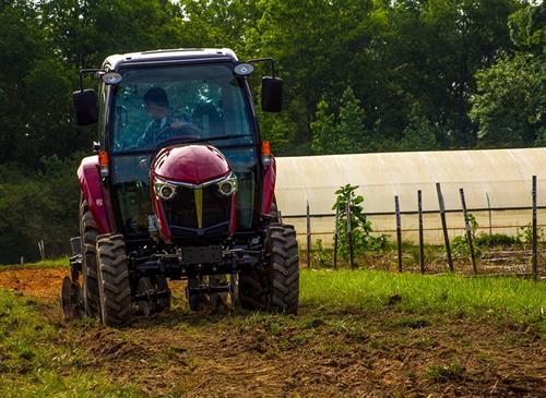 yanmar front disc harrows driving through land