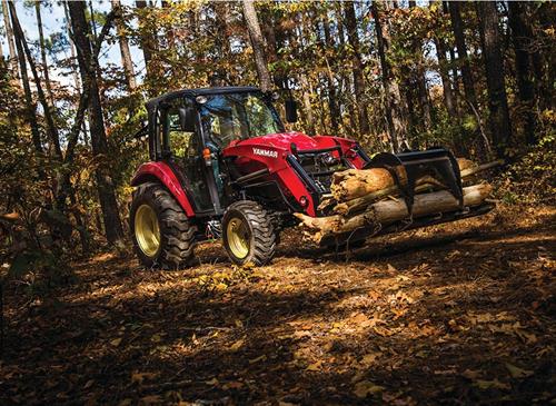 yanmar yt 359 compact tractor right side in dirt