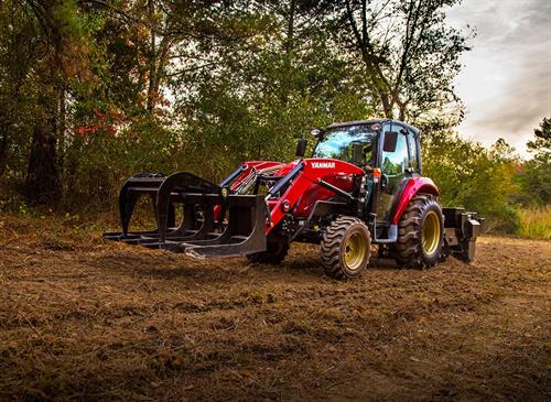 yanmar yt 359 compact tractor left side in dirt