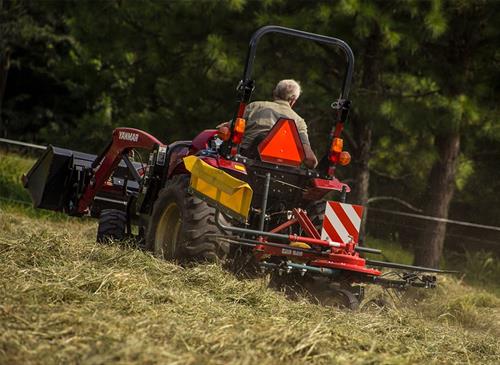 back angle of tedder rake driving on land