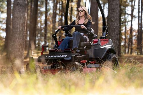 woman mowing with a Yanmar YZ360 Zero-Turn Radius Mower
