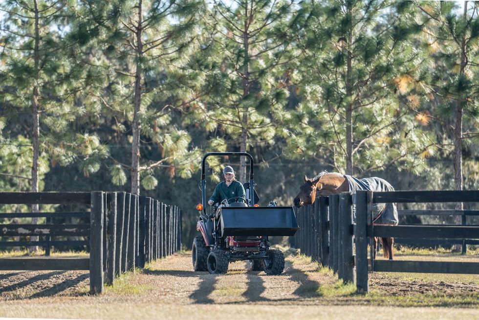 Man talking care of a horse using his SA223 KURO