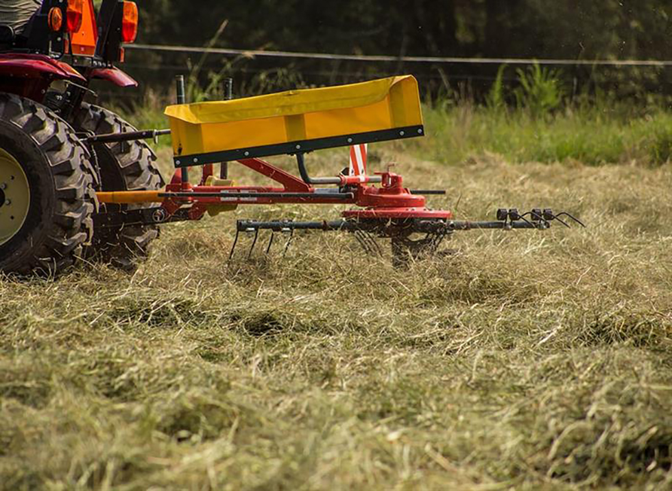 close up of tedder rake on land