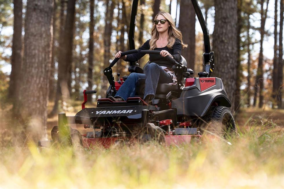 woman mowing with a Yanmar YZ360 Zero-Turn Radius Mower